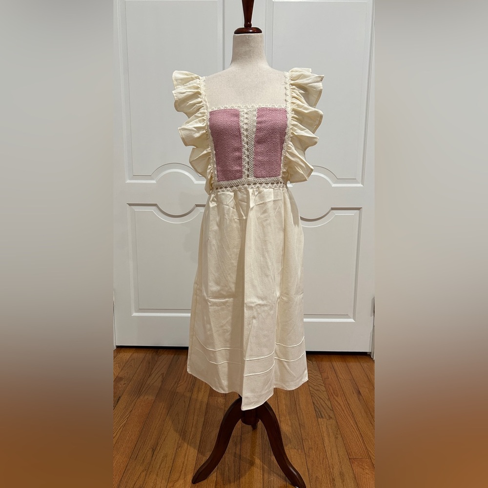 Handloom Mexican embroidered dress with ruffle sleeve.